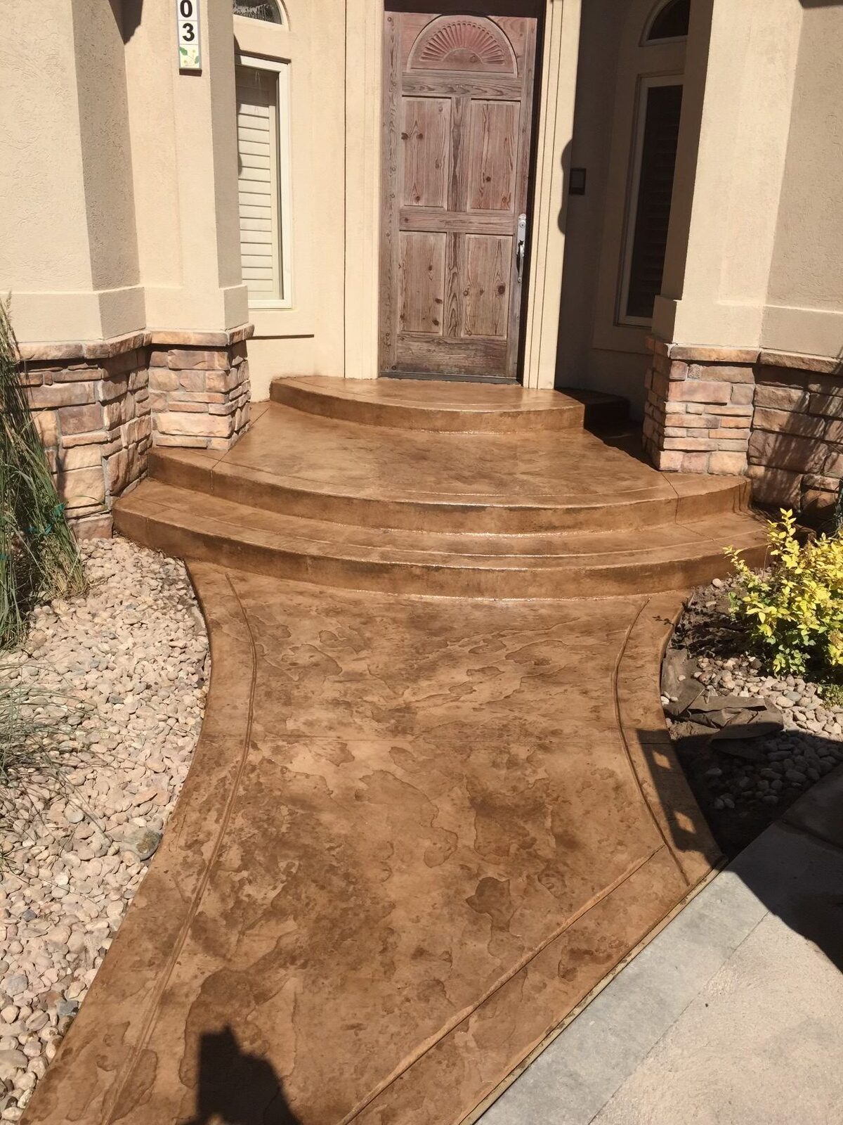 Stamped concrete walkway and steps